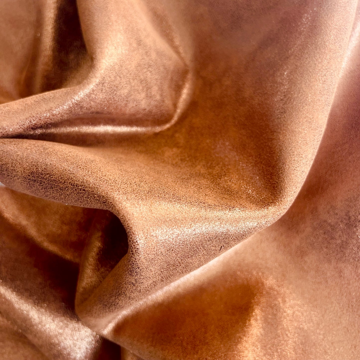 menottes sur mesure 
en cuir bronze