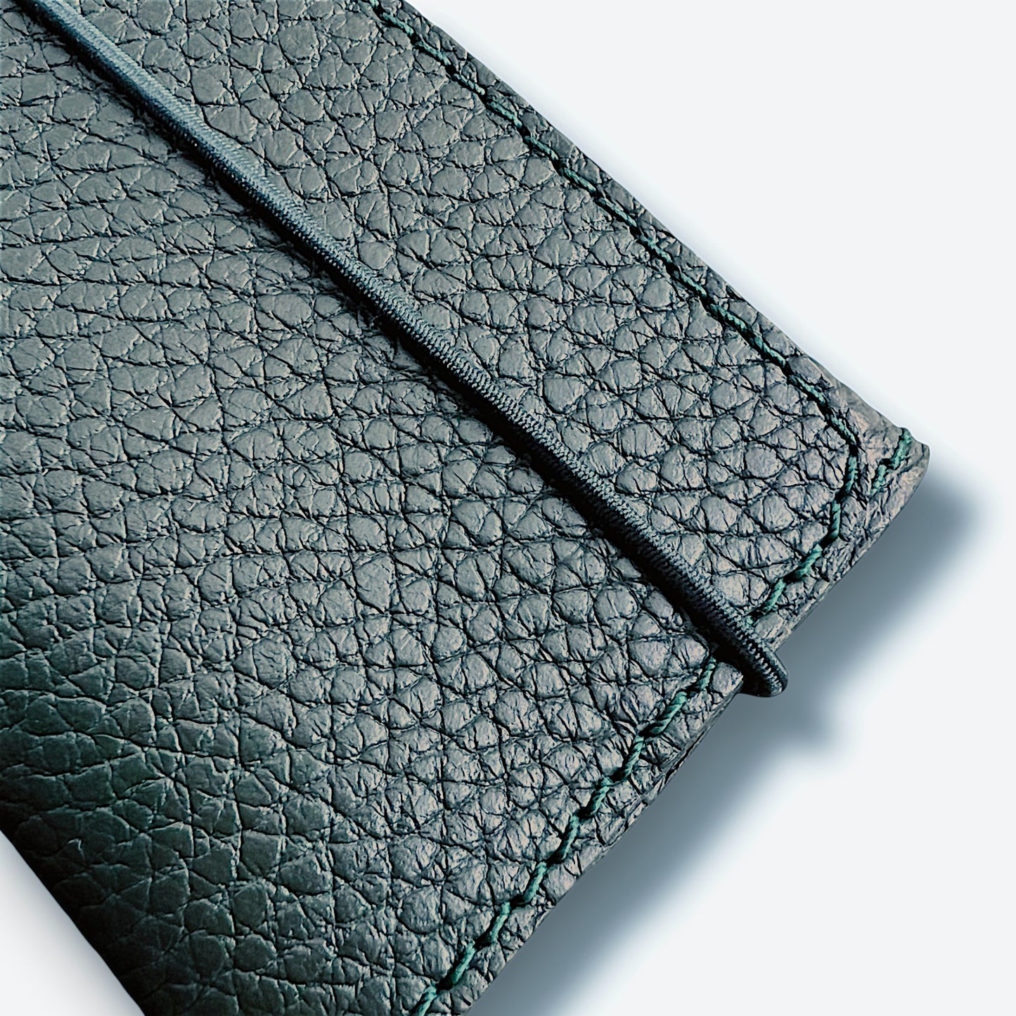 petit porte-monnaie en cuir vert foncé utilisation mixte