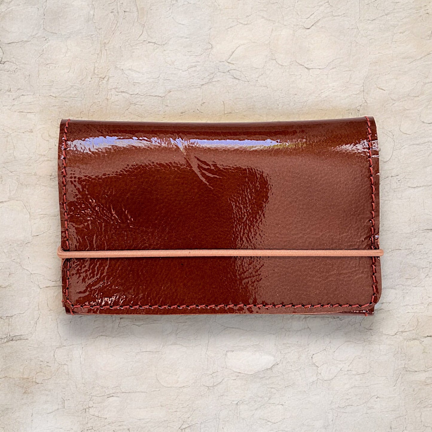Porte-carte/monnaie/billets format Pocket 3 en Nocciola/ sable
