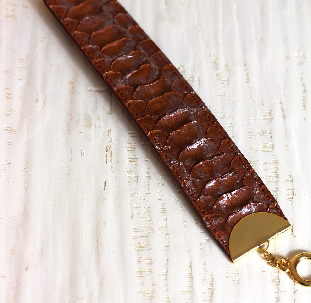 Manchette en python marron Sienne