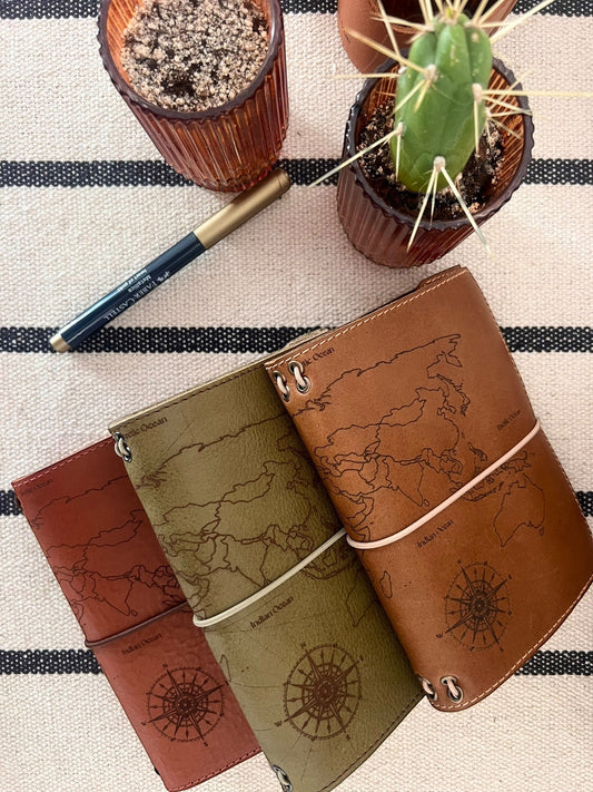 Carnet de voyage en cuir artisanal et rechargeable : le compagnon incontournable des voyageurs modernes