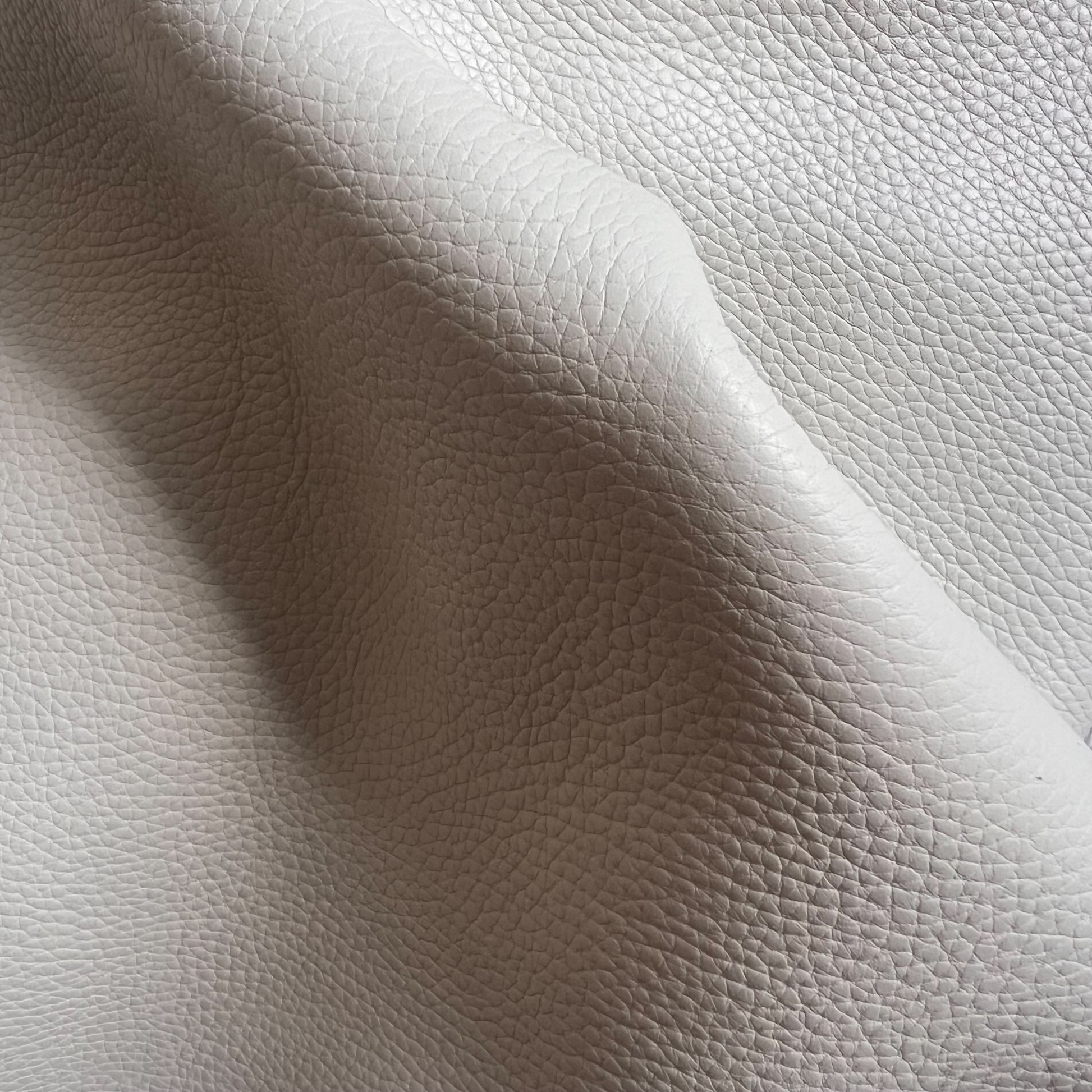 menottes en cuir blanc
