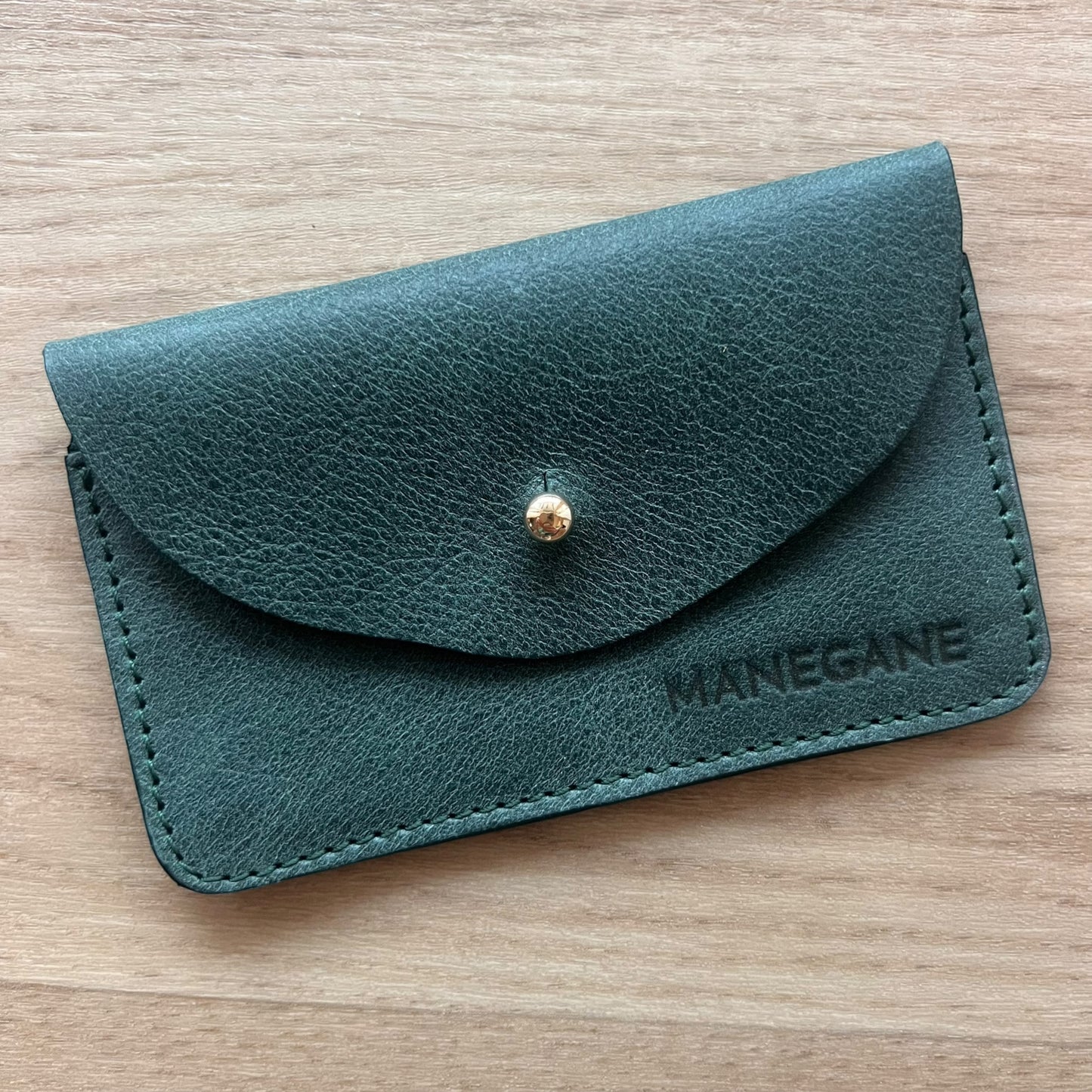 porte-carte en cuir vert foncé