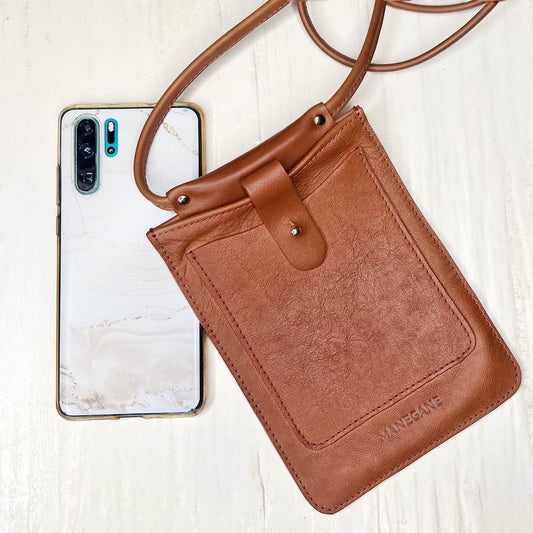étui à téléphone en cuir marron manegane